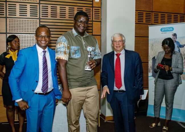 Congratulations for the Africa Overall Winner Mr. Abdoulaye Oudloguem of Leader Pressing Mali by Mr. Celestin Yoboue (l) and Peter Wennekes (R)