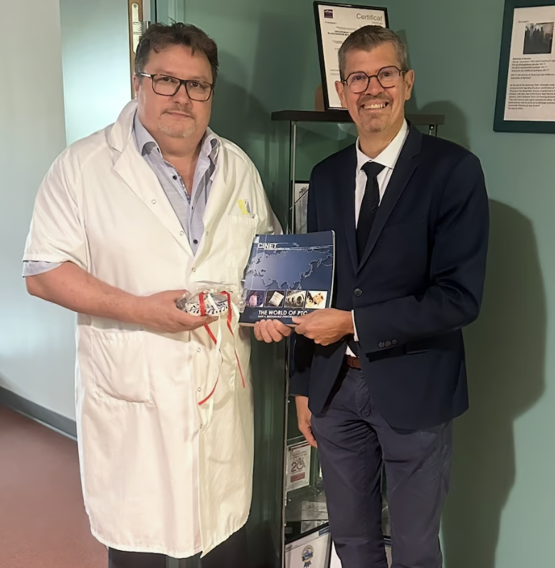 Mr. Frederic Whecler thanks Mr. Gilbert with CINET book The World of PTC, Safe & Sustainable Processing.