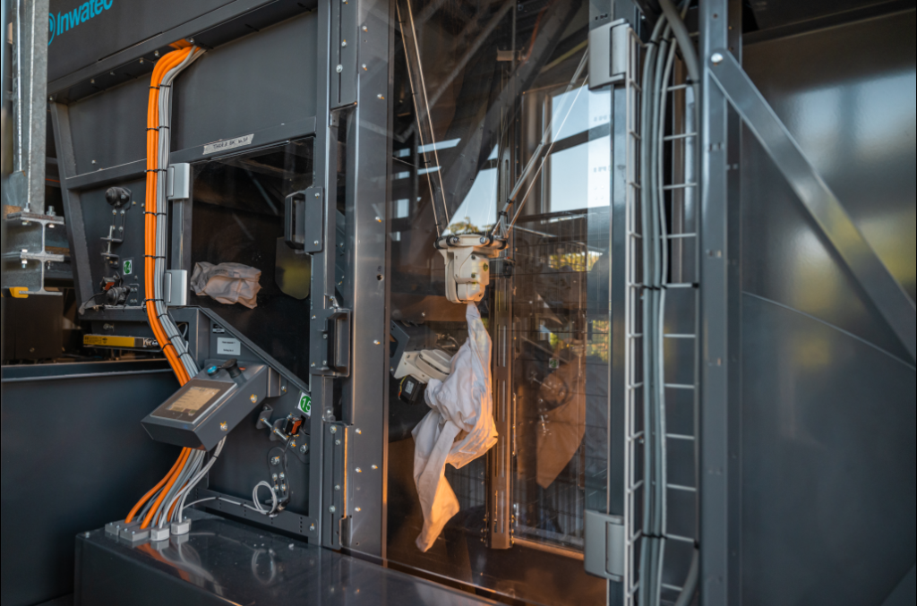 Inwatec Automatic Soiled Side Sorting: Proven automation to solve labor shortages, boost accuracy, and streamline soiled sort — with over 150 systems installed worldwide.